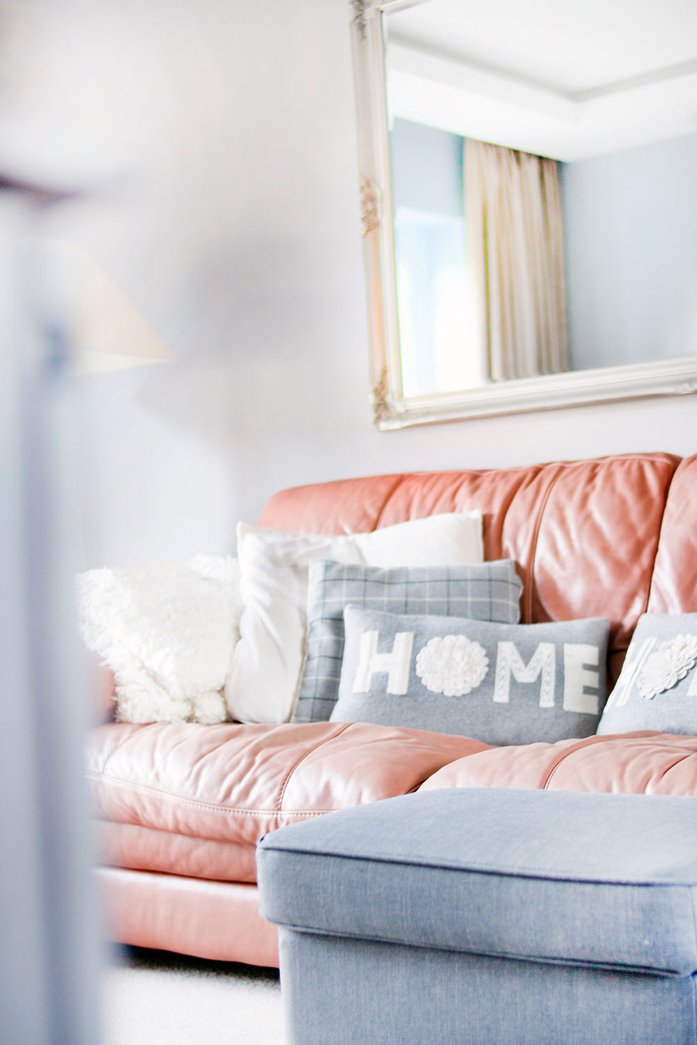 red couch with cute gray throw pillows