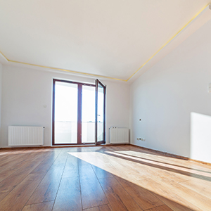 empty living room with wood floors
