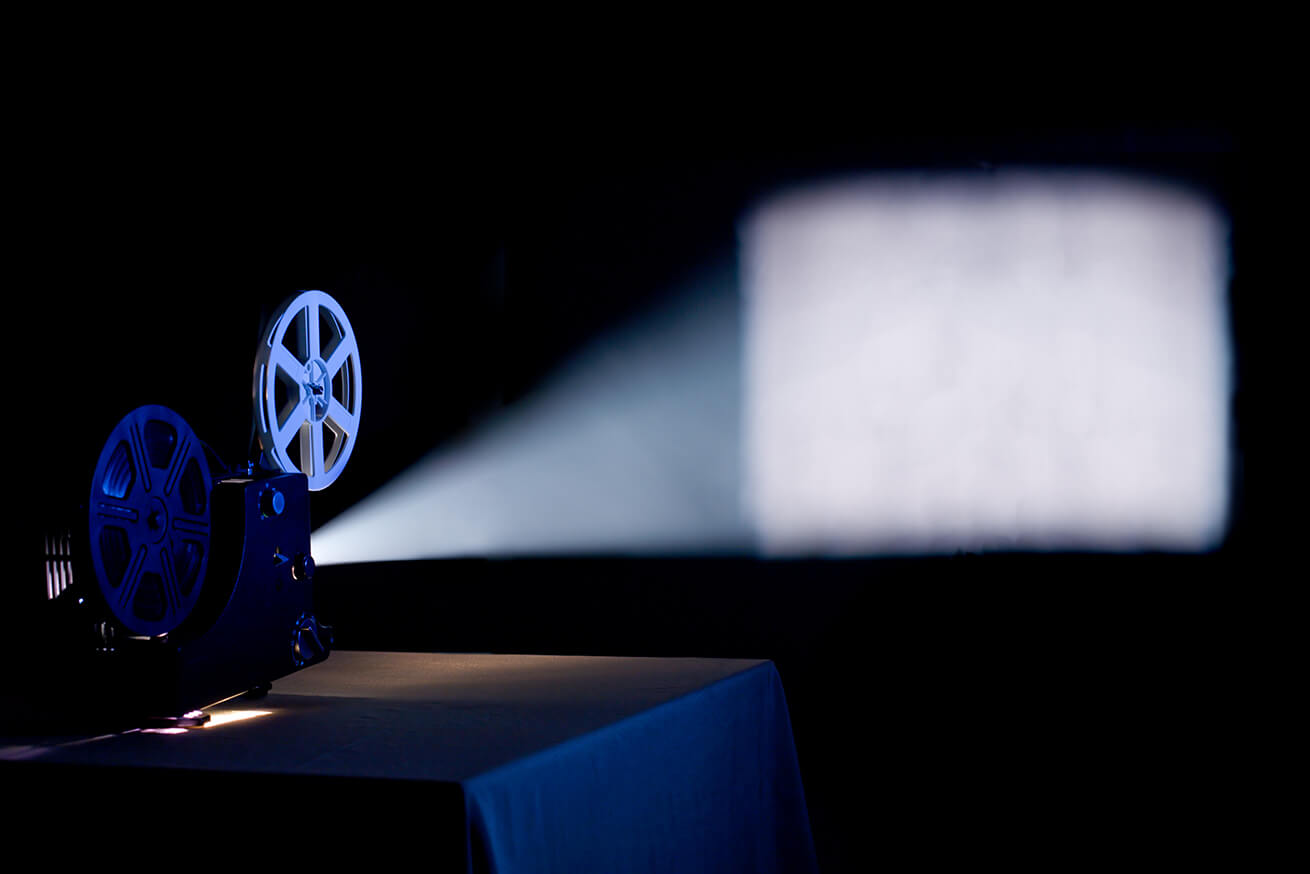movie projector in a dark room