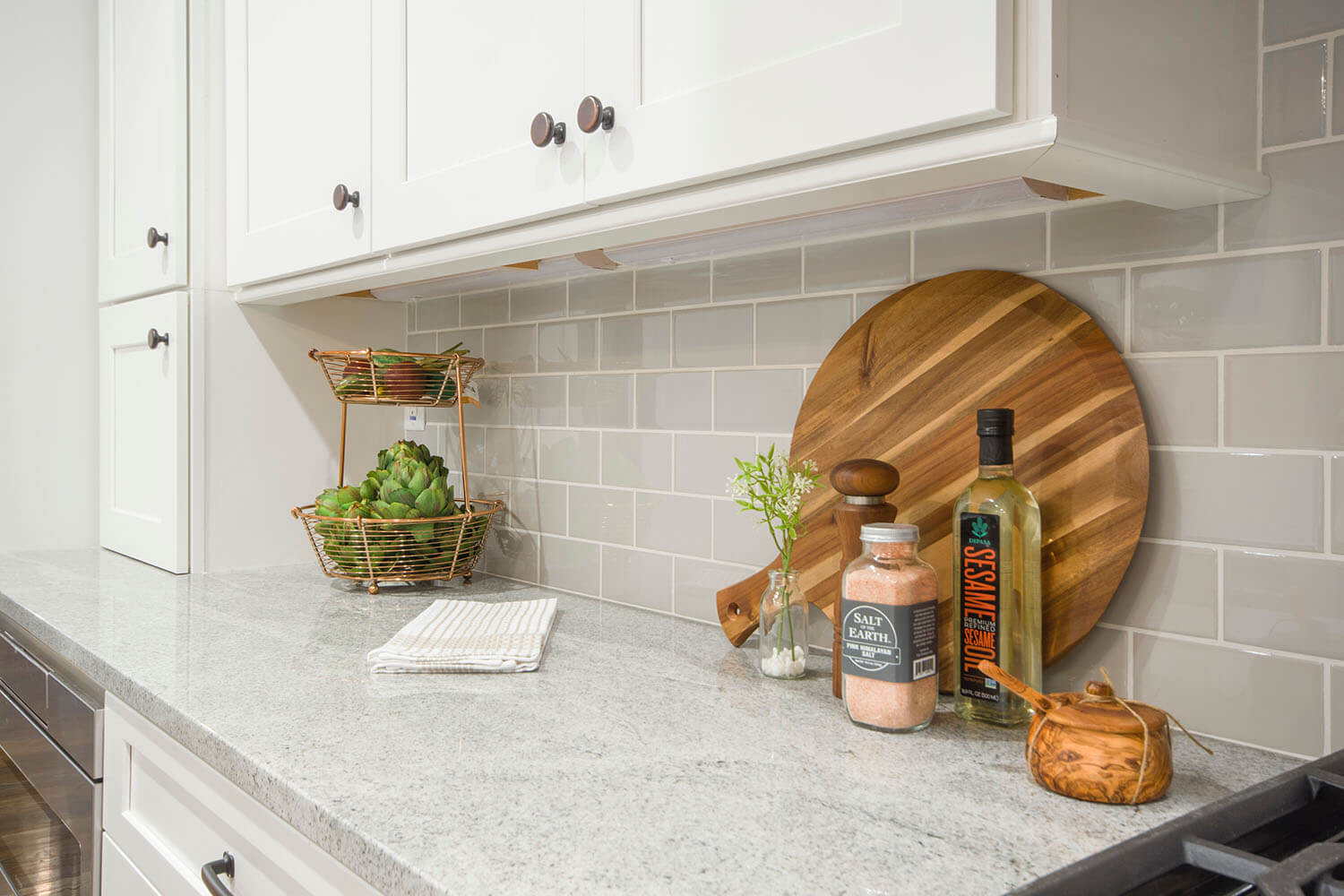 granite countertops with subway tile backsplash