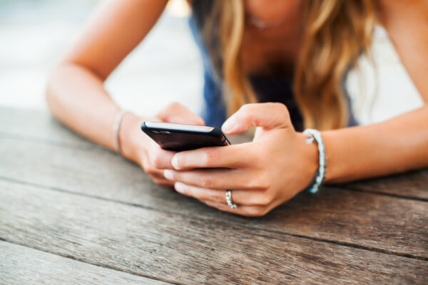 woman looking at her phone