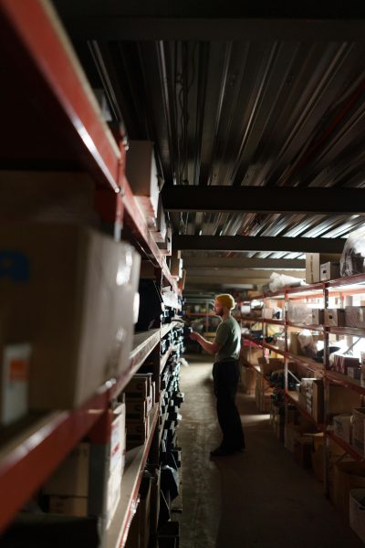 person checking inventory in a maintenance closet