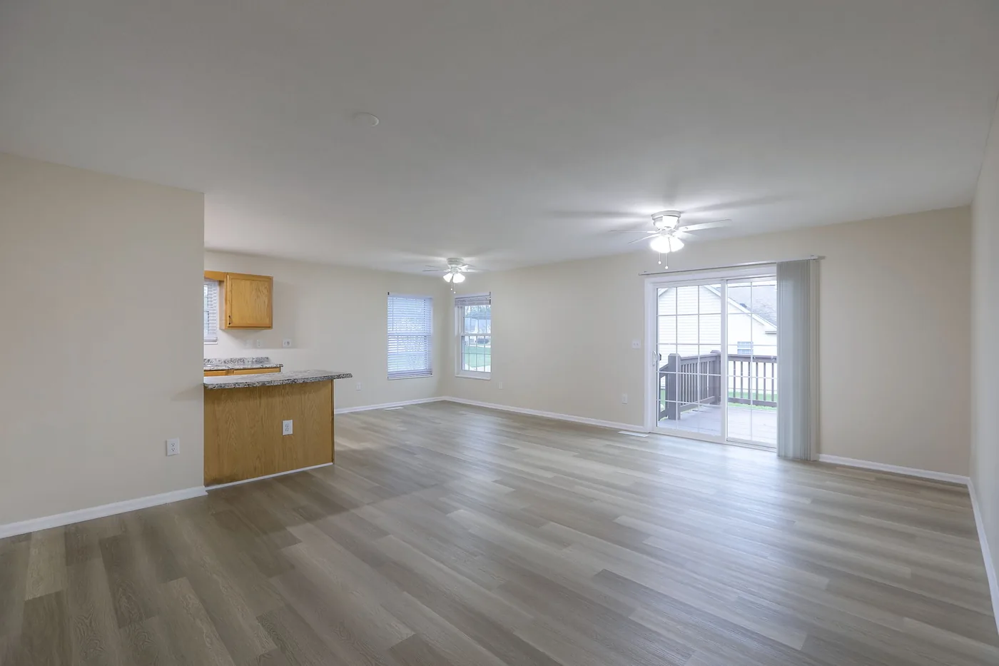 Renovated rental living room with new LVP flooring